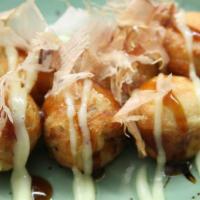 Takoyaki  · Comes with 6 pieces octopus ball topped with bonito fish flakes.
