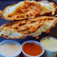 Chicken Pastelito · Round crispy patties with shredded chicken and cheesy mashed potatoes.