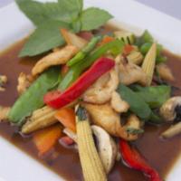 Spicy Thai Basil · Bell peppers, onions, mushrooms, snow peas and baby corn stir fry in spicy brown sauce.