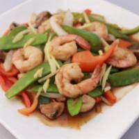 Fresh Ginger · Fresh ginger, garlic, bell peppers, mushrooms, onions and snow peas stir fry in brown sauce.