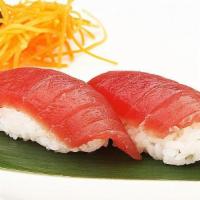 Tuna sushi · 2 pieces of tuna on top with sushi rice