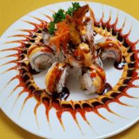 Temptation Roll · Shrimp Tempura, crab mix ,cream cheese topped with crab stick, Eel sauce, spicy mayo and sri...