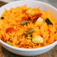 Rice with veggies · Basmati rice, eggplant, zucchini, yellow squash, red and yellow peppers.
