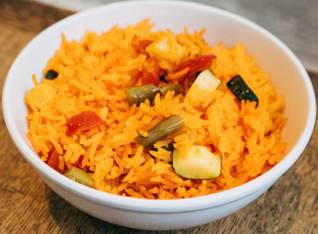 Rice with veggies · Basmati rice, eggplant, zucchini, yellow squash, red and yellow peppers.
