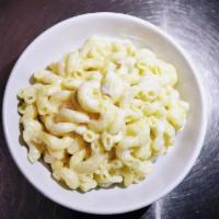 Mac and Cheese · A mixed of parmesan, gooda and mozzarella cheese with a touch of milk.
