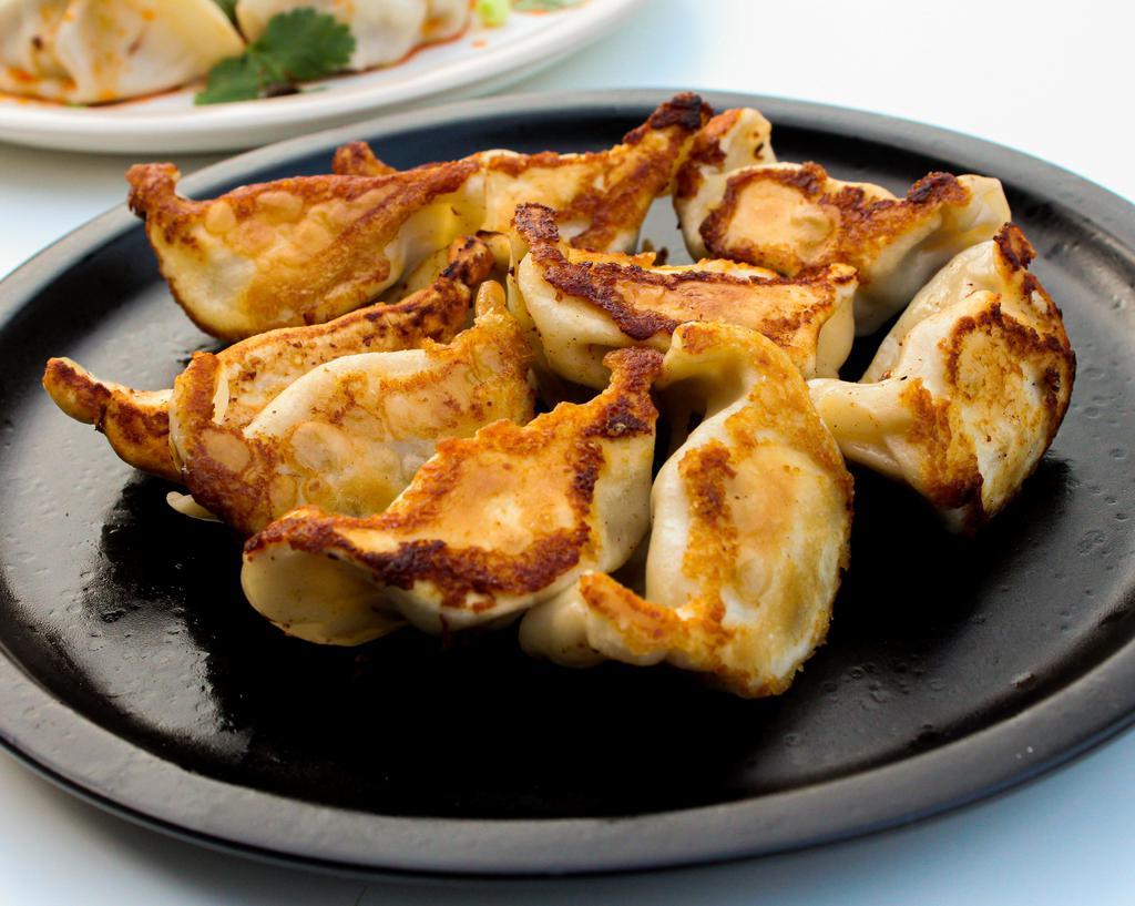 Dumplings · 8 pieces. Steamed or fried. Choice of pork, vegetable or shrimp for an additional charges.