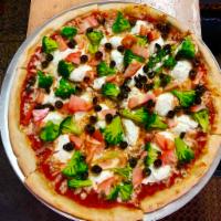 Cassi Pizza · Ricotta, spinach, fresh tomato, and mozzarella cheese