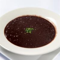 Sopa de Frijoles · Comes with black beans soup.