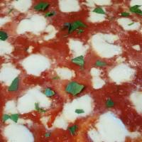 Margherita Pizza · Tomato sauce, cheese, and oregano.
