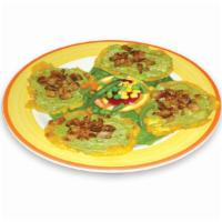 14. Tostones con Guacamole y Chicharron · Green plantain with avocado and pork skin.