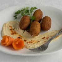 4 Meat Kibbe · Fried croquette stuffed with cooked minced beef.