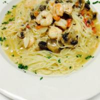 Gio's Baby Shrimp Angel Hair Pasta · Baby shrimp, angel hair, mushrooms, onions, chopped tomatoes in oil and garlic topped with g...