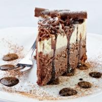 Chocolate Mousse Cake · Light and fluffy chocolate mousse filling | Whipped Cream | Chocolate shavings 