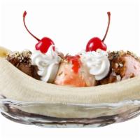 Banana Split  · Three scoops ice cream | Two Toppings | Whipped Cream | Cherries | Chocolate Sauce 