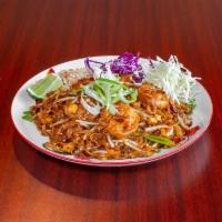 Pad Thai  · Thai rice noodles, tofu, bean sprout, green onion, and egg served with lime and crushed pean...