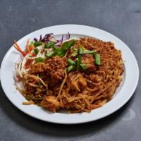 42. Phad Thai · Thai rice noodles stir fried with egg, ground peanuts, green onion and fresh bean sprouts. S...