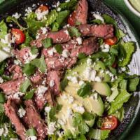 Black and Blue Salad · Certified grass fed New York strip steak served on organic mix greens, tomatoes, avocado, ca...