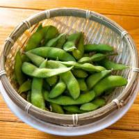 Edamame · Steamed green soybeans served with yuzu salt.
