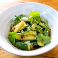 Smashed Cucumbers · Seasoned with Sichuan spicy sauce.