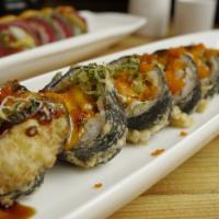 Godzilla Roll · Spicy tuna, avocado and cream cheese inside, deep fried on top with eel sauce and spicy mayo...