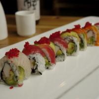 Rainbow Roll · Kani, cucumber and avocado inside, tuna, salmon, yellowtail, avocado, tobiko on top.