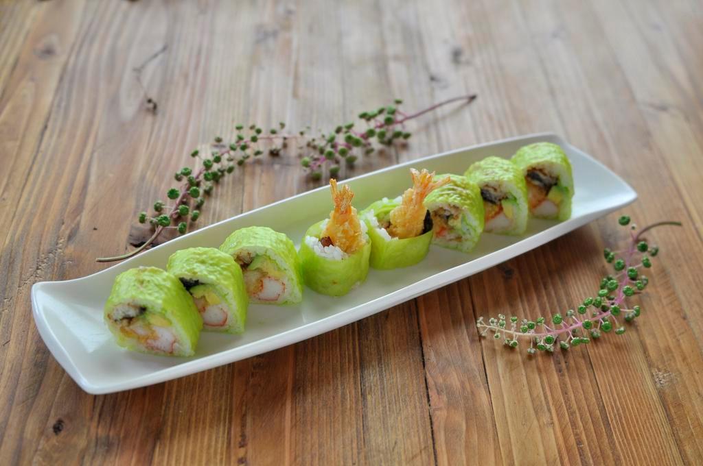 Green Fuji · spicy crabmeat, shrimp tempura, eel & avocado wrapped in green- soybean seaweed & eel with spicy- mayo sauce