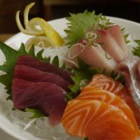 Sashimi Entree · 18 pieces assorted sashimi. Served with side.