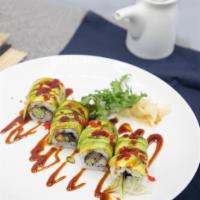 J12. Dragon Roll · Eel, cucumber, inside wrapped with avocado, topped with caviar and eel sauce.
