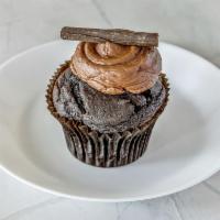 Chocoholic Cupcake · Chocolate cake frosted with chocolate buttercream topped with chocolate shavings.