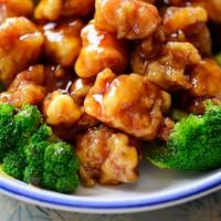 S2. General Tso's Chicken · Chunks of boneless chicken sauteed in hunan sauce, lightly breaded, surrounded by broccoli. ...