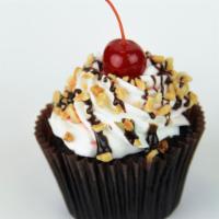 Hot Fudge Sundae  · Chocolate cake, filled with fudge, topped with buttercream, fudge, peanuts, and a cherry.