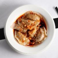 A7 Szechuan Dumplings (6)* · Pork dumplings, chili oil and peanuts.