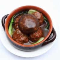 A15 Homestyle Meatballs · Beef meatballs with flower mushroom and bok choy.