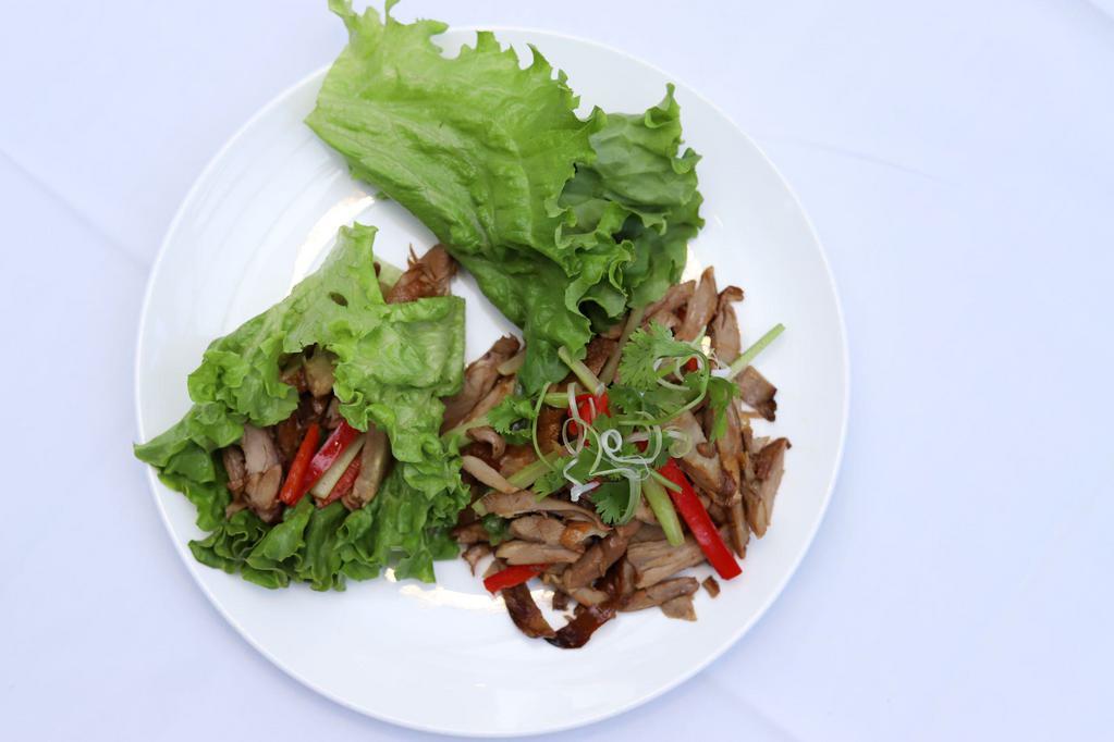 C2 Smoked Duck · Stir fried shredded duck, fresh ginger and scallions.