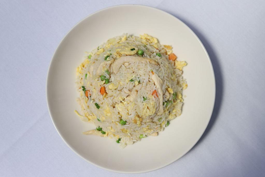 N6 Fried Rice · Stir fried with eggs, carrot, green peas, onion, and scallions.