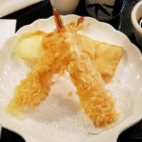 Tempura Appetizer · Deep-fried shrimp & mixed vegetables served with tempura sauce.