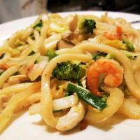 Yaki Udon · Sauteed udon noodle with shrimp, chicken, mushrooms and vegetables (served with miso soup).