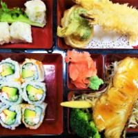 Bento Box D Combo · Salmon teriyaki. Shrimp shumai, tempura, California roll. Includes miso soup, house salad, w...