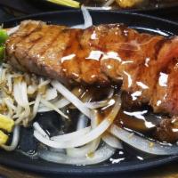Beef Teriyaki · Broiled beef served with teriyaki sauce. Includes miso soup, house salad and white rice.
