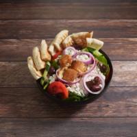 Feta Salad · Israeli feta, Kalamata olives, cucumbers, red onion, plum tomatoes, and garlic croutons with...