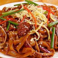 54. Beef Chow Fun · Soft wide rice noodle. 