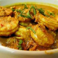 81. Curry Shrimp · Served with rice. Hot and spicy.