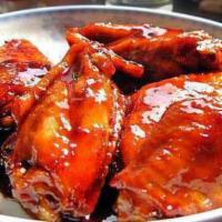 H11. Chicken Wing with Garlic Sauce · Hot and spicy.