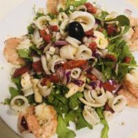 Cold Seafood Salad · Shrimp, octopus and calamari.