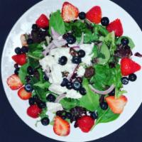 Mixed berry salad · Mixed green, strawberries, blueberries, goat cheese, red onions and candied walnuts.