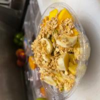 Golden Acai Bowl · Acai, banana, pineapple, mango, coconut flakes, almonds, and granola.