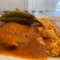 Chiles Rellenos · One pepper(Chile relleno) stuffed with cheese and egg. Served in sauce of jitomate (tomato s...