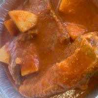 Costillas en chipotle  · Pork ribs with chipotle sauce and sliced potatoes. Comes with rice, beans, and tortillas. 