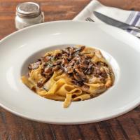 Pappardelle al Funghi · Homemade; served with mixed mushroom ragu sauce and truffle oil.