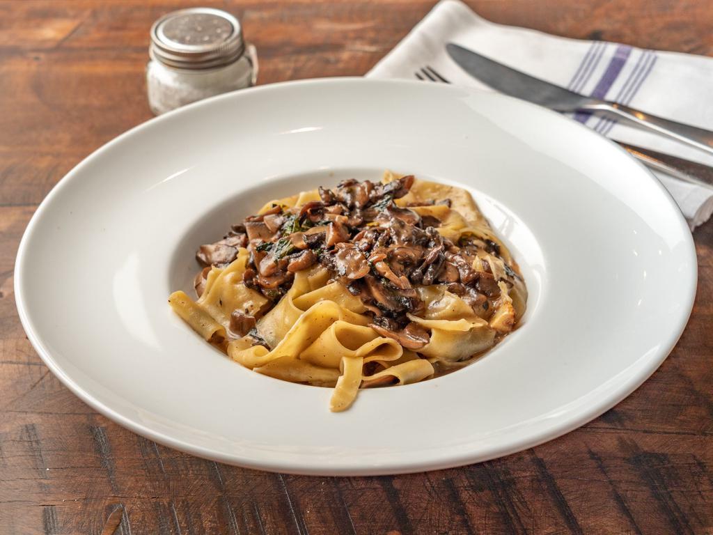 Pappardelle al Funghi · Homemade; served with mixed mushroom ragu sauce and truffle oil.